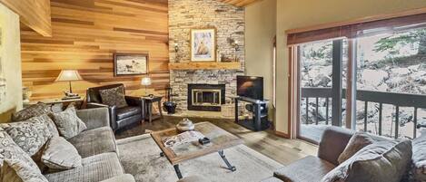 1791 Lakeside Getaway at Deer Valley! Free Deer Valley Skier Shuttle! - a SkyRun Park City Property - Cozy Living Room with Wood Burning Fireplace