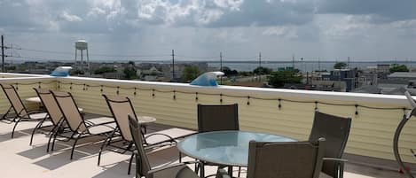 private rooftop deck with bay and ocean views