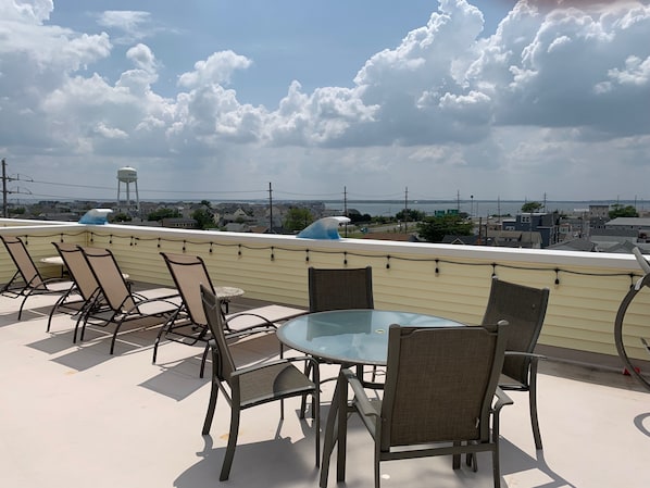 private rooftop deck with bay and ocean views