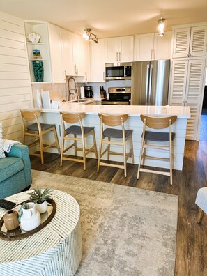 New bar stools with backs in kitchen