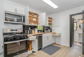 Spacious Kitchen to cook meals with | spices | | Oil | Provided IThe coffee station is provided with a | Drip coffee machine | | Keurig coffee machines with pods | | Tea Kettle/Water Heater | | Creamer | | Sugar | | Multiple Tea sachets |