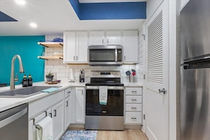 Stainless steel appliances & a laundry closet for your use