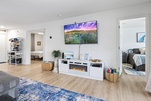 Equipped with a coffee bar, electric fireplace, extra blankets and pool towels!