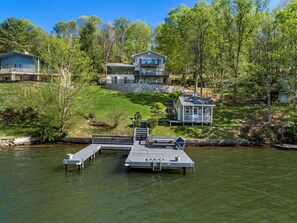 View of the dock and home from the lake. 