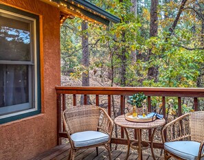 The deck offers a cozy spot to enjoy your morning coffee and is especially colorful in the fall.