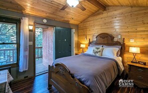 This cozy suite features a plush queen bed 