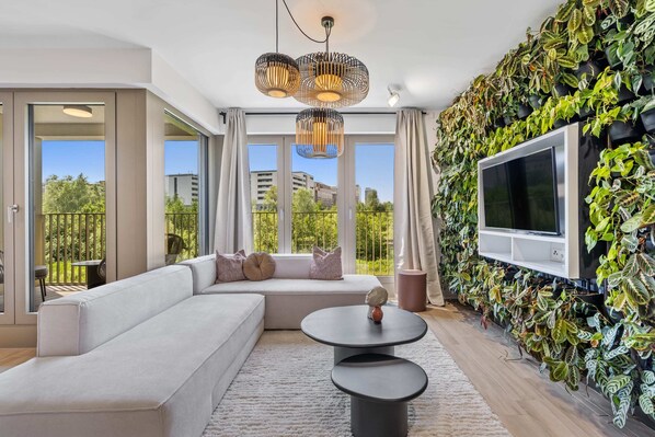 Cozy up in this urban oasis with vibrant greenery.