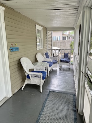 Outside screened in porch off dining room.