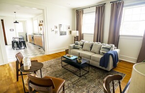 Cozy textiles and soft lighting help Willow House feel like home away from home.