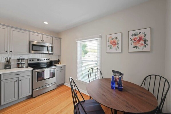 Full Eat-In Kitchen with SS Appliances and Table Seating