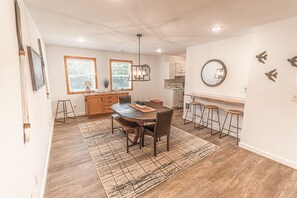 This large dining room right off the kitchen is a perfect gathering place. 