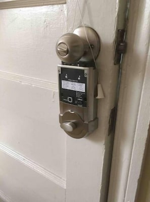 Door lock from inside the house. To lock it turn the knob you see on the lock. 
