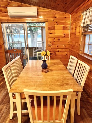 Spacious dining area for any meal or additional workspace with lake views