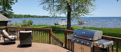 Huge deck for grilling, socializing, sunbathing, and enjoying the lake.