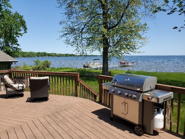 Huge deck for grilling, socializing, sunbathing, and enjoying the lake.