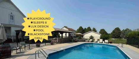 {Outdoor Pool} Soak up the sun and cool off in this inviting summer retreat.