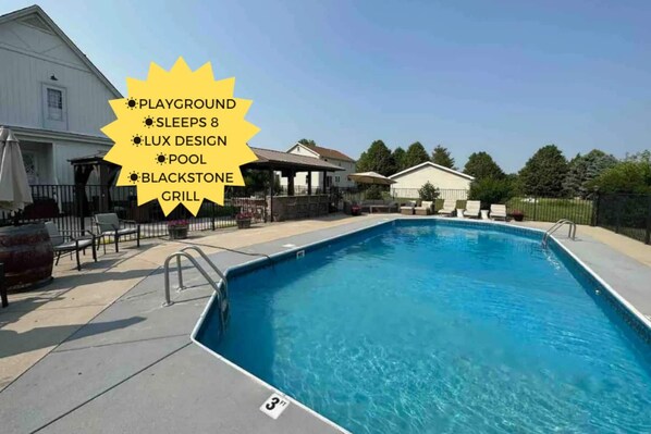 {Outdoor Pool} Soak up the sun and cool off in this inviting summer retreat.