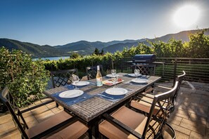 Outdoor dining with lake views, perfect for catching sunsets