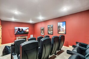 Enjoy a movie in the private theater room with 12 seats plus 4 bean bag chairs