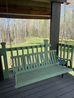 Enjoy a leisurely swing on the front porch