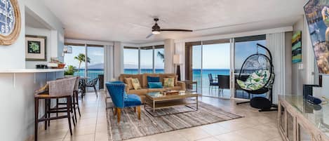 Beautifully furnished corner, oceanfront condo with wrap around lanai.