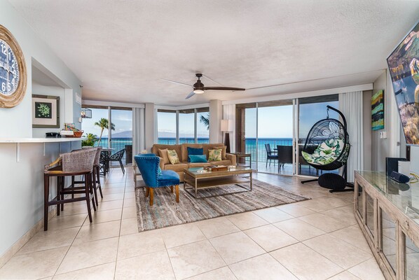 Beautifully furnished corner, oceanfront condo with wrap around lanai.