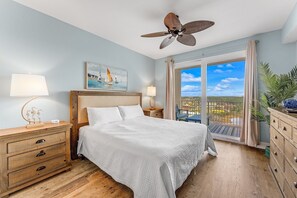 Primary Bedroom with King Size Bed, Ensuite Bathroom, Flat Screen TV, Lake Views and Direct Balcony Access