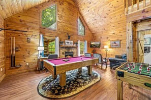 Living room with comfortable workspace.