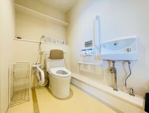 The 1st floor toilet is equipped with ostomates