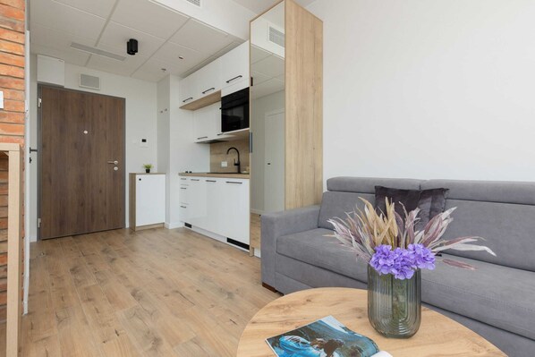 The living area offers a perfect blend of comfort and modern style. 