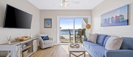 Living room with sleeper sofa, balcony access & wonderful view.