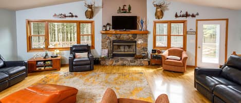 Spacious Living Room with a wood burning fireplace