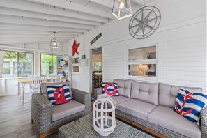 Sneak a peak into the kitchen from the sunroom!