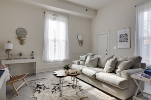 Open concept living room and kitchen allows family and friends to stay together to socialize and reconnect.