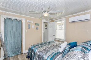 The bathroom and laundry room are accessible to this bedroom.  Each bedroom as well as the living room have their own mini-split air units (on wall to the right of the window) to allow for more individual comfort levels.