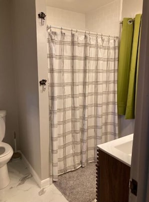 Owner's suite bath has large shower.