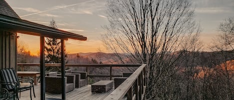 Enjoy scenic views from your expansive deck--fully equipped w/ outdoor seating