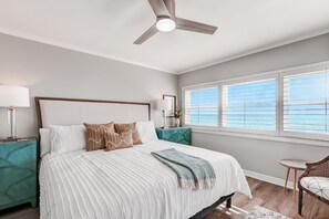Master Bedroom with Oceanfront Views, Access to the Spacious Balcony, and a Flat Screen Smart TV (King Bed)
