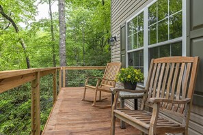 Enjoy your morning coffee in the rocking chairs on the upper deck.