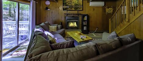 This view is the living room, as seen from the first seat at the dining table. 