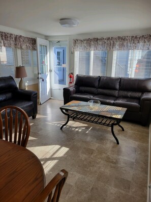 Bright, airy and cozy living room with easy ground level access 