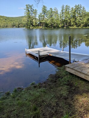 40 feet of pond frontage with sandy bottom good for swimming and dock