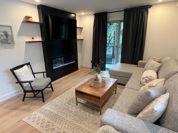 A beautiful electric fireplace creates the perfect ambiance for our guests. Enjoy curling up on the comfortable couch with a great book and look out the window to the alpine and mountainous views.