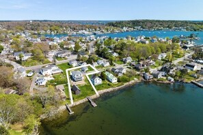 Arial View of property and BoothBay harbor.  Property lot outlined