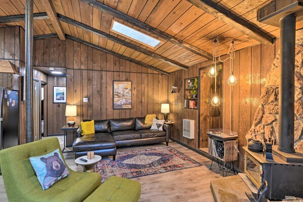 Welcome to Camp Foretex. The living space provides a record player & woodstove