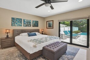 King sized bed with a great view overlooking the pool