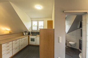 Ferienwohnung mit 1 Schlafzimmer und Grillmöglichkeit-Küche