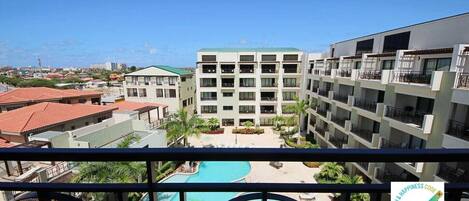 Relax and unwind with a stunning view of the pool.