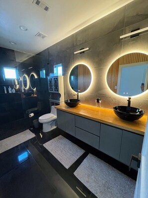 Double sink modern designed w/ glass shower & space to store all of your items