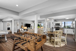 The lower level offers Air Hockey, Foosball, Arcade games, and more.